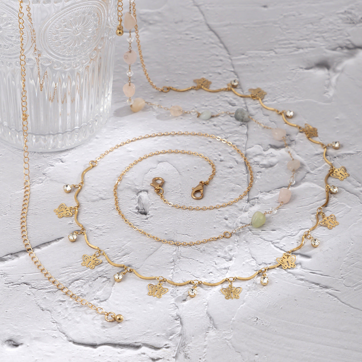 Double-layered crystal-coloured butterfly tassel body chain
